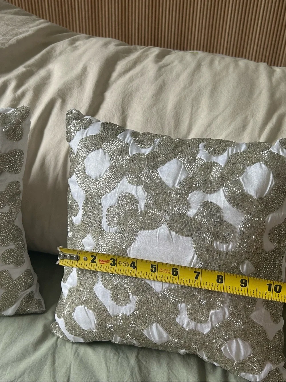 White Decorative Throw Pillow Pair with Beaded Silver Pattern